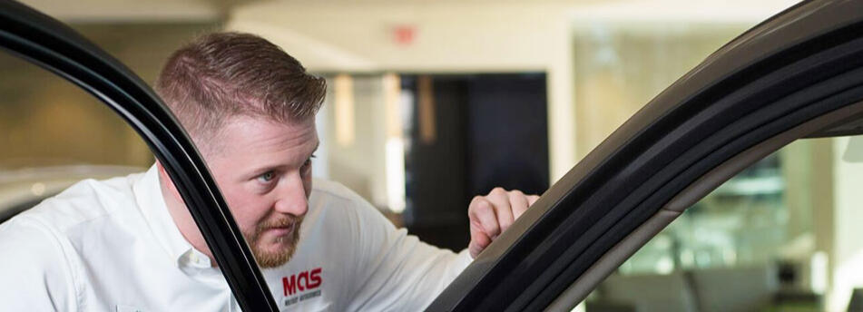 Military Autosource staff helping a customer